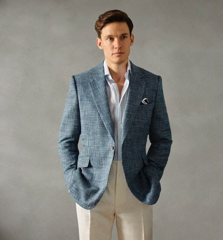 Blue Textured Blazer with Cream Trousers and Pocket Square
